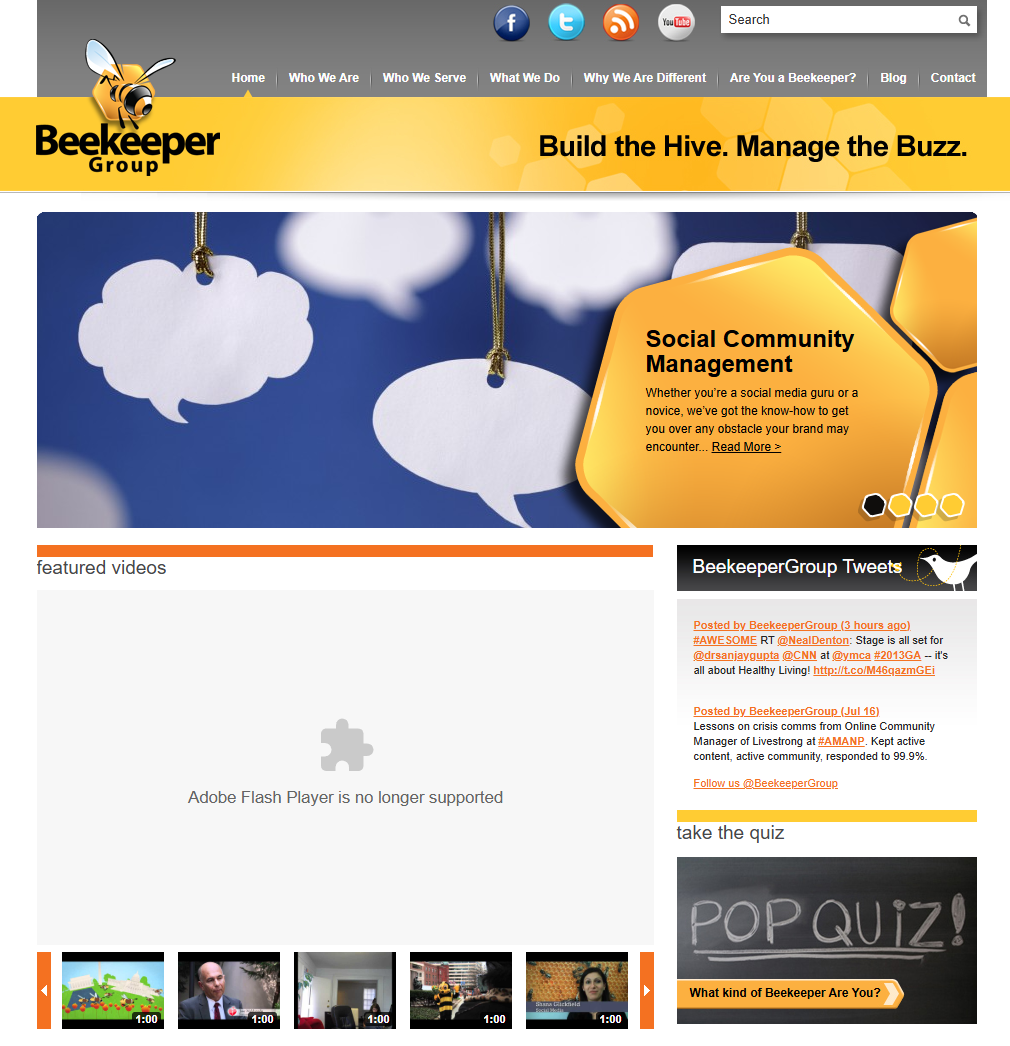 Screenshot of Beekeeper Group’s website. The header features a bee logo, speech bubbles, and a honeycomb design. The main section highlights buzzing social community management, tweets, and a row of video thumbnails at the bottom.